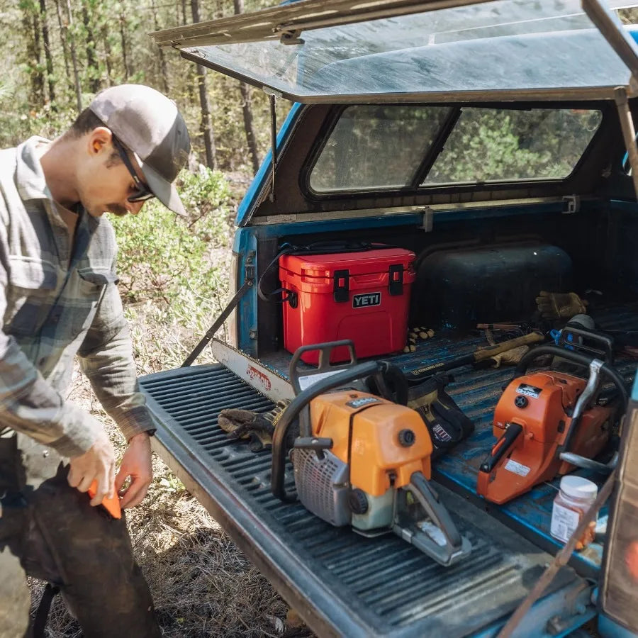 15Quart Hard Cooler with DoubleDuty Shoulder Strap for Outdoor Adventures Ice Retention Up to 5 Days Durable Rugged Design.